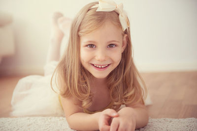 Portrait of smiling girl at home