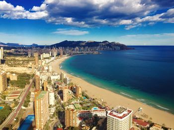 Scenic view of sea against cloudy sky