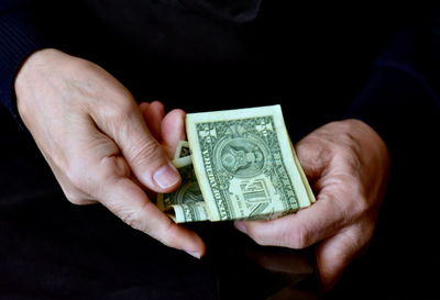 Close-up of hand holding baby