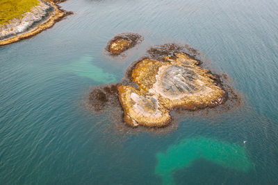 Aerial view land over sea