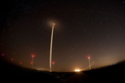 Low angle view of illuminated stars against sky at night