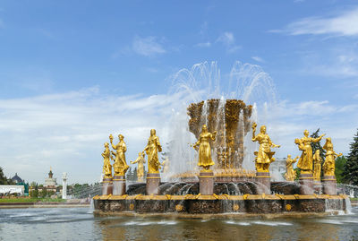 Statue of fountain against sky