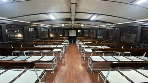 Empty chairs in ferry