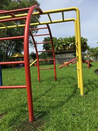 Playground in park against sky