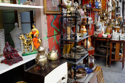 Statues on table at market stall