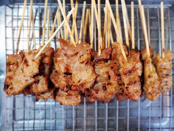 Close-up of meat on barbecue grill