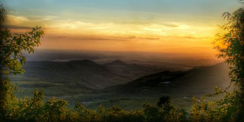 Scenic view of landscape at sunset