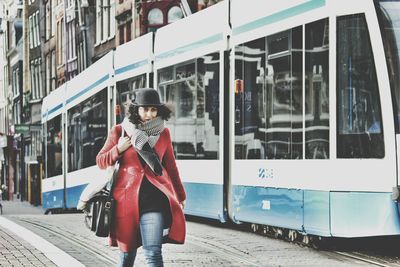 Woman standing in city