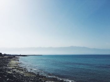 Scenic view of calm sea against clear sky