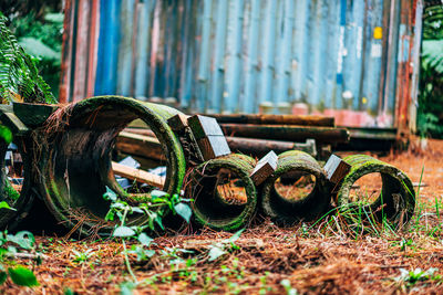 Old rusty wheel on field
