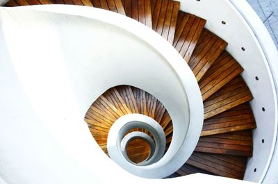 Directly above shot of coffee cup on wooden table