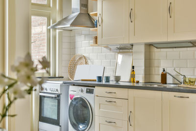 View of kitchen in modern apartment