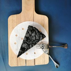 High angle view of leaf on cutting board