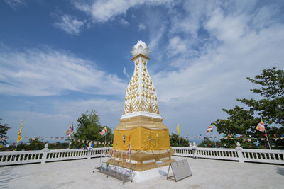 Low angle view of statue against sky