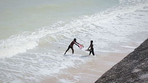 People enjoying at beach