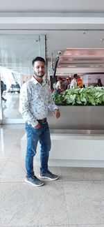 Full length of man standing at airport