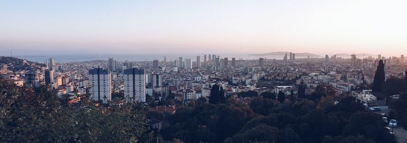High angle view of buildings against sky during sunset