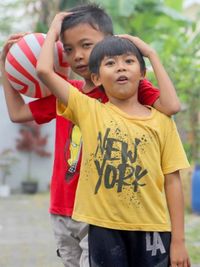 Full length of a boy standing outdoors