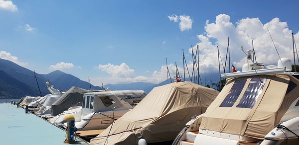 Panoramic view of sailboats in sea against sky