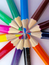 Close-up of colored pencils on table