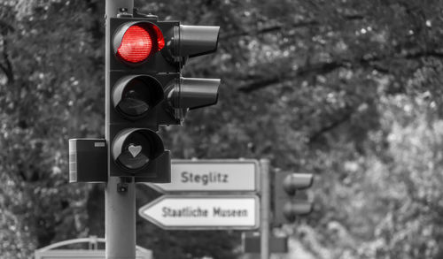 Close-up of stop light on road signal