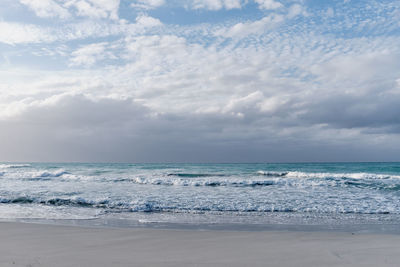 Scenic dramatic seascape.waves, dark cloudy sky. sandy beach of atlantic ocean, varadero, cuba