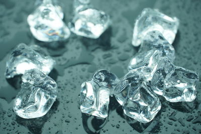 High angle view of ice crystals on rock