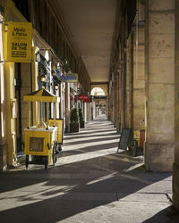 Road amidst buildings in city