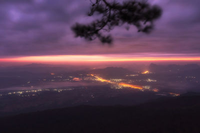 Scenic view of silhouette trees against sky at sunset