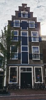 Low angle view of residential building against sky