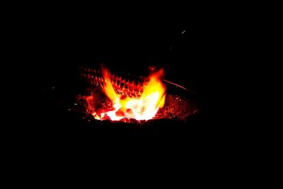 Lit fire in the dark