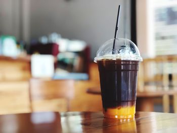 Close-up of beer in glass on table