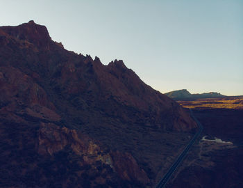 Scenic view of mountains against clear sky