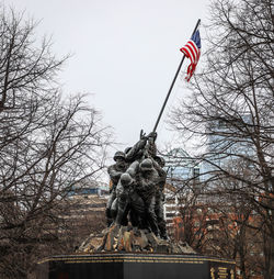 Low angle view of statue against sky