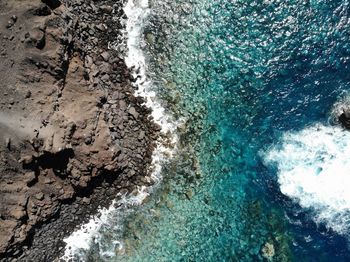 High angle view of rocks on beach