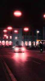 Illuminated street lights at night
