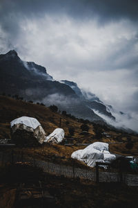 Scenic view of snowcapped mountains against sky