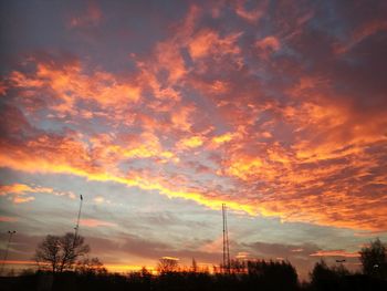 Low angle view of dramatic sky during sunset