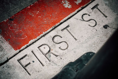 High angle view of text on stone