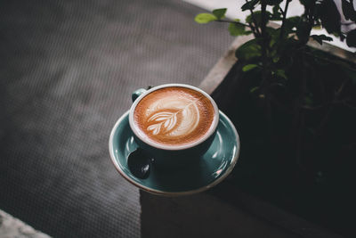 High angle view of cappuccino on table