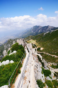 High angle view of road by mountain against sky