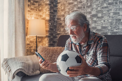 Man playing soccer ball