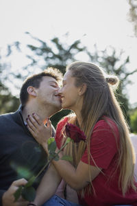 Young couple kissing outdoors