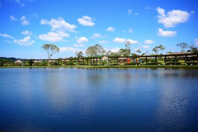 Scenic view of lake against blue sky