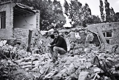 Man sitting on old ruins