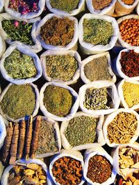 Directly above shot of various spices for sale in market