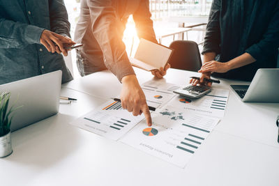 Group of people working on table