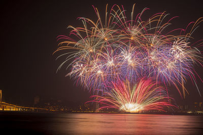 Firework display at night