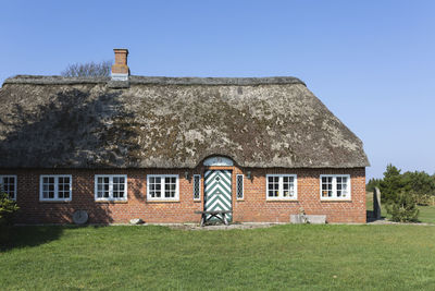 Denmark, romo, rustic house with thatched roof