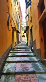 Narrow alley along buildings